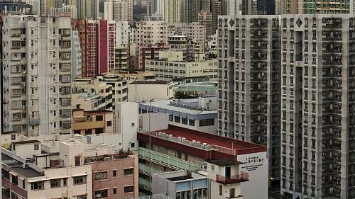 high rise city with high-rise buildings during day time town